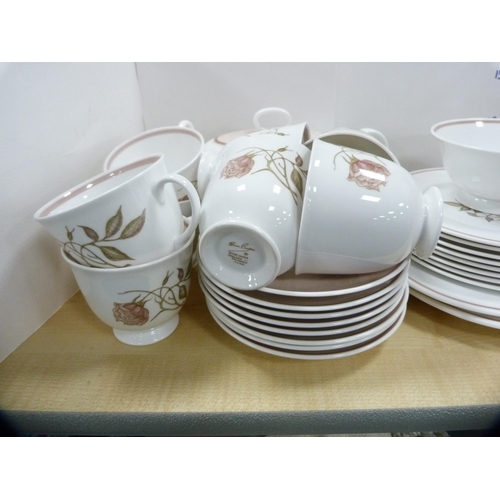 129 - Susie Cooper part tea set and a continental coffee set.