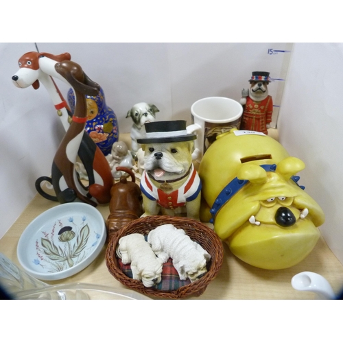 130 - Model of a British Bulldog, novelty money box, Beefeater figure, Russian doll etc.