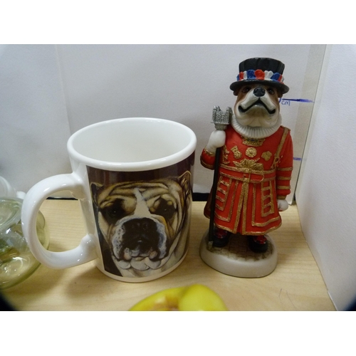 130 - Model of a British Bulldog, novelty money box, Beefeater figure, Russian doll etc.