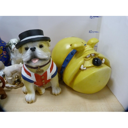 130 - Model of a British Bulldog, novelty money box, Beefeater figure, Russian doll etc.