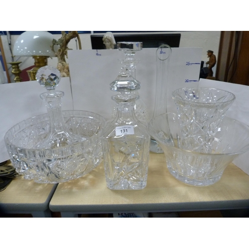 131 - Large cut glass fruit bowl, three decanters and three other items.