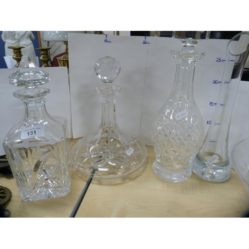 131 - Large cut glass fruit bowl, three decanters and three other items.