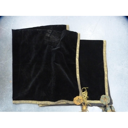 138 - Two black velvet gilt mounted tasselled bridge cloths.