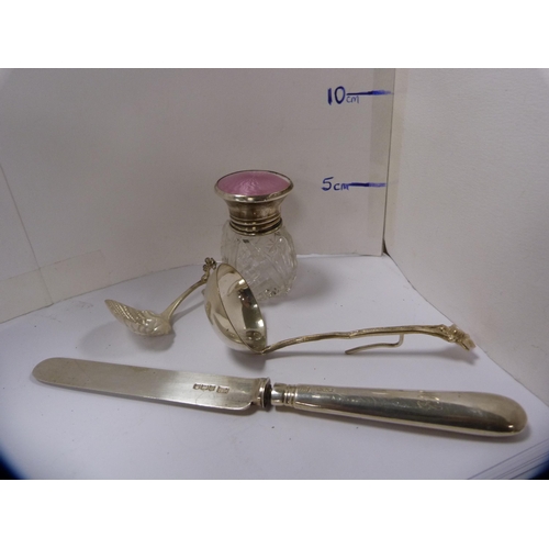 139 - Silver and enamel top scent bottle, sauce ladle, silver-handled knife and a caddy spoon.