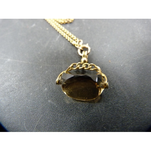 151 - Quartz fob on yellow metal mount and 9ct gold chain, chain approximately 4.5g.