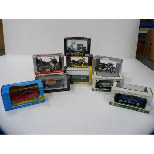 164 - Nine assorted boxed diecast vehicles and motorcycles to include examples by Maisto and Vanguards.&nb... 