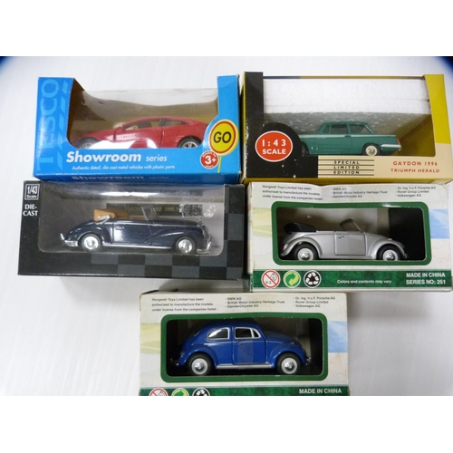 164 - Nine assorted boxed diecast vehicles and motorcycles to include examples by Maisto and Vanguards.&nb... 