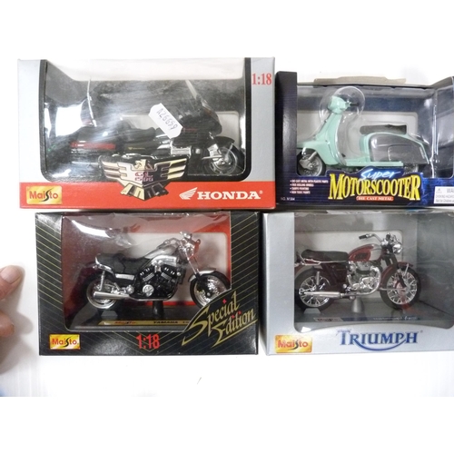 164 - Nine assorted boxed diecast vehicles and motorcycles to include examples by Maisto and Vanguards.&nb... 