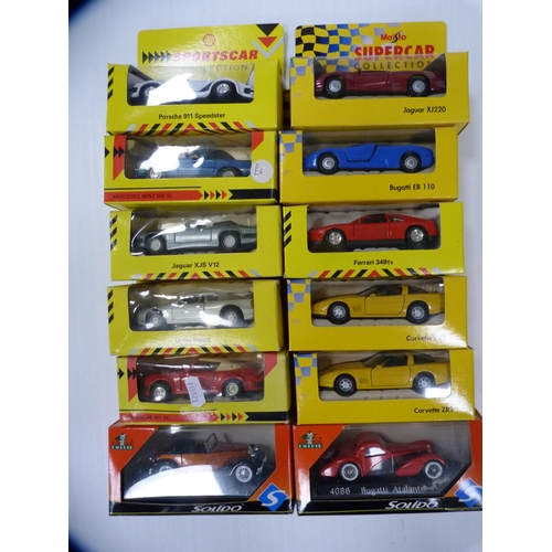 166 - Twelve assorted diecast cars and vehicles to include example by Solido, Maisto and Shell Classic Spo... 