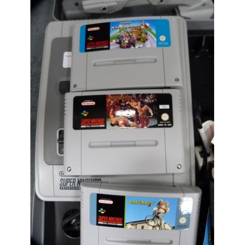 180 - Super Nintendo console, Super NES scope, assorted games and accessories, with carry case.