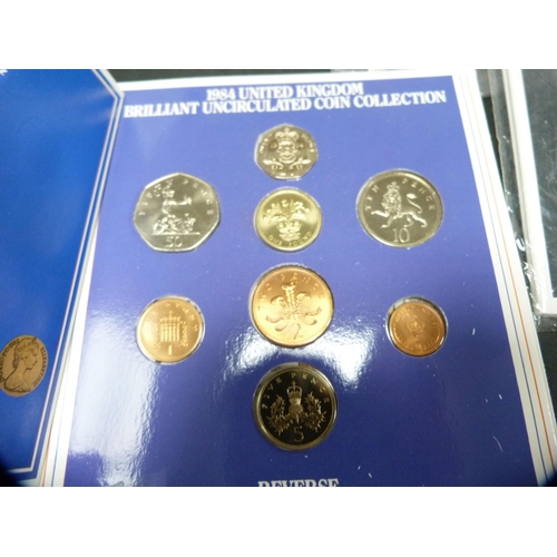 198 - Three sleeves containing UK uncirculated coin collections, 1983 and 1984, also Queen Victoria and la... 