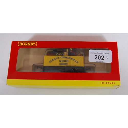 202 - Hornby: three OO gauge models to include two 70th Anniversary 1938 - 2008 7 plank open wagons R6414 ... 