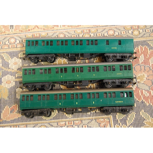 207 - Two cartons containing OO gauge rolling stock to include three Tri-ang R121/222 coach and brake carr... 