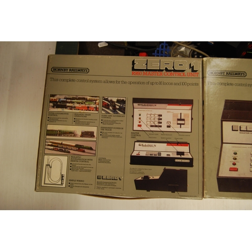 234 - Carton containing model railway power supplies, transformers and control units to include two boxed ... 