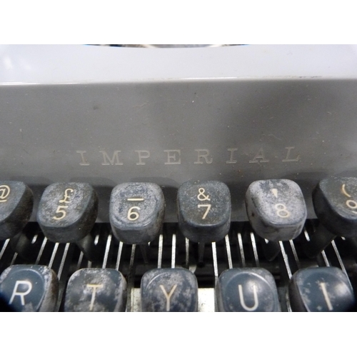 29 - Cased Imperial typewriter.