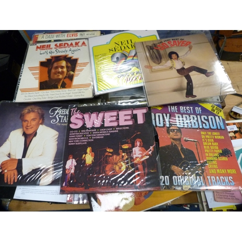 300 - Collection of pop and rock vinyl records to include Elvis Presley and The Beatles.