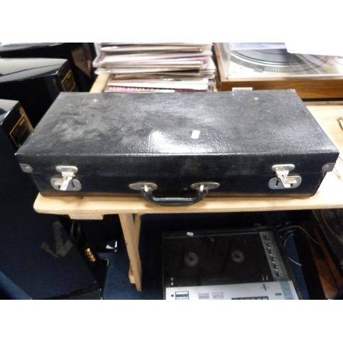 301 - Saxophone, in fitted case.