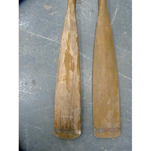 308 - Pair of vintage wooden boat oars.