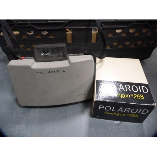 310 - Carton containing assorted cameras to include folding Kodak cameras, boxed Kodak film tank, Polaroid... 