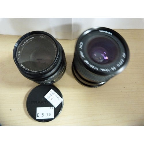 313 - Pentax K1000 camera with Tokina 70-210mm lens, Asahi Pentax ME camera with 35-70mm lens, and a Prakt... 