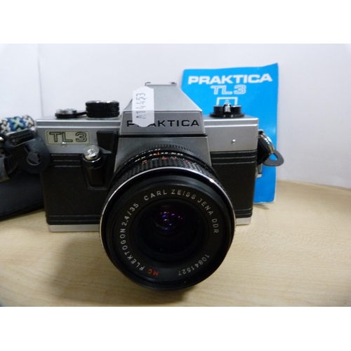 316 - Praktica Super TL camera with Miranda 28mm lens, a Praktica TL3 camera with Carl Zeiss lens and a Pr... 