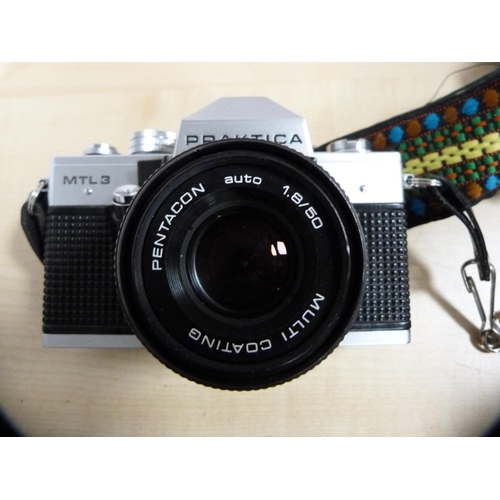 316 - Praktica Super TL camera with Miranda 28mm lens, a Praktica TL3 camera with Carl Zeiss lens and a Pr... 