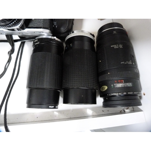 340 - Group of cameras to include Pentax MX with Asahi 50mm lens, Canon AV-1 with Sigma lens, boxed Mirand... 