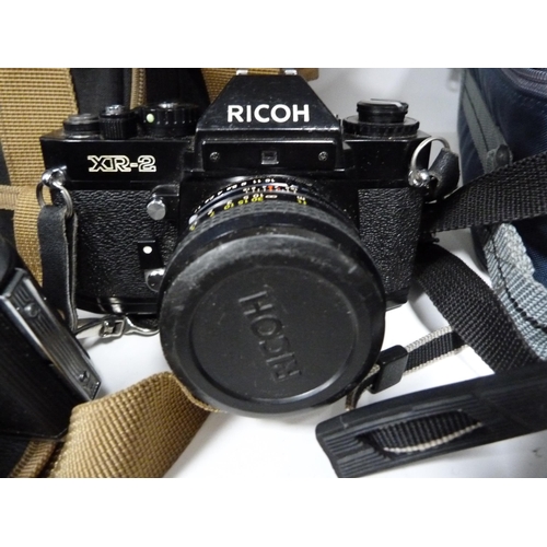 341 - Group of cameras to include a Ricoh KR-10 and XR-2, Zenit B, Praktica BX20 with accessories, Makinon... 