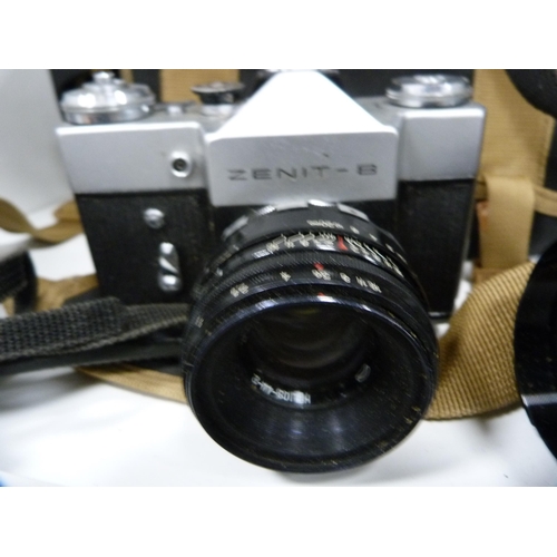 341 - Group of cameras to include a Ricoh KR-10 and XR-2, Zenit B, Praktica BX20 with accessories, Makinon... 