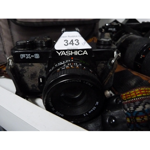 343 - Group of cameras to include a Yashica FX-3 and FX-D, Minolta, Cosina, Fujica, Canon Eos Rebel, Konic... 