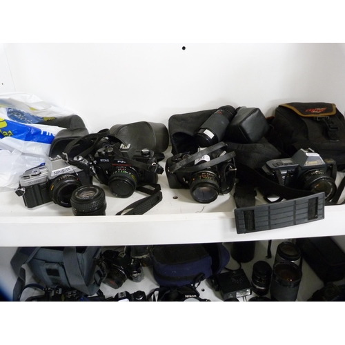 352 - Group of cameras to include a Fuji STX-2, Canon T70, Cosina PM-1, Minolta X-300, Praktica Pentacon 5... 