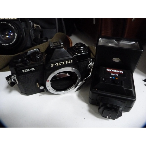 354 - Group of cameras to include an Olympus CM10, Minolta Dynax 3000i with accessories, Petri GX-1, Minol... 