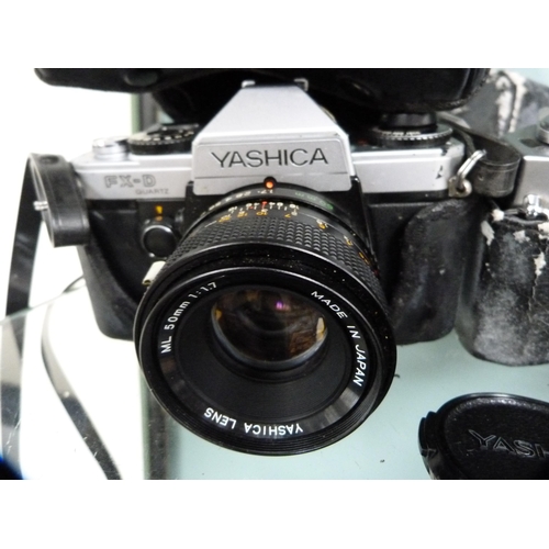 355 - Yashica FX-D Quartz camera with Yashica 50mm lens and a Yachica TL Electro X camera with Pentacon le... 