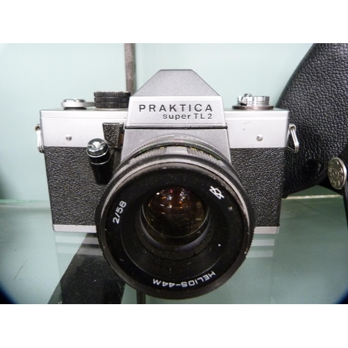 357 - Four Praktica cameras to include an MTL3, BMS, IV F, and a Super TL2, the IV F and MTL3 with Carl Ze... 