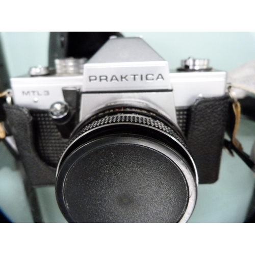 357 - Four Praktica cameras to include an MTL3, BMS, IV F, and a Super TL2, the IV F and MTL3 with Carl Ze... 