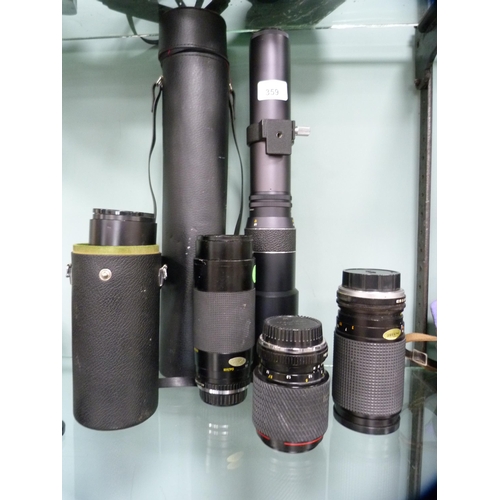 359 - Group of camera lenses to include an Optomax 50mm with case, Sigma macro focusing auto zoom, no. 225... 