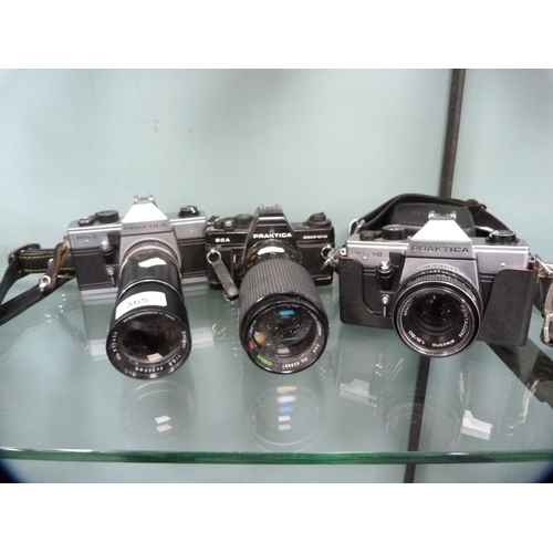 365 - Three Praktica cameras to include an MTL5 with Soligor 200mm lens, BCA with 200mm lens, and an MTL50... 