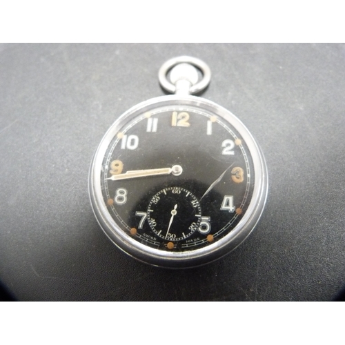 387 - Two military issue pocket watches, both with black dials, one stamped G.S.T.P, no. 259468.  (2)