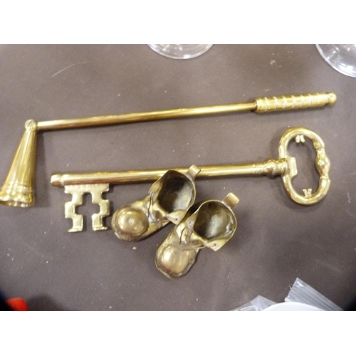 4 - Collection of brassware to include a brass rocking chair, two pairs of brass candlesticks, candle sn... 