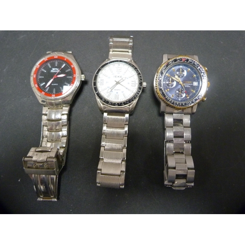 400 - Three gent's quartz wristwatches to include Pulsar chronograph 100 metres, Slazenger and Ieke, on fl... 