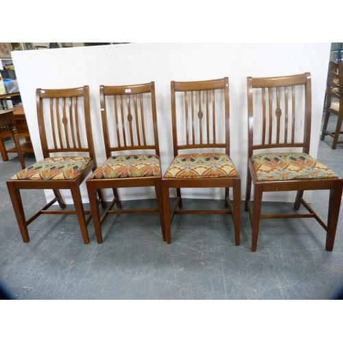 425 - Set of four mahogany rail-back dining chairs with Art Nouveau-style upholstery.  (4)