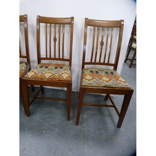 425 - Set of four mahogany rail-back dining chairs with Art Nouveau-style upholstery.  (4)