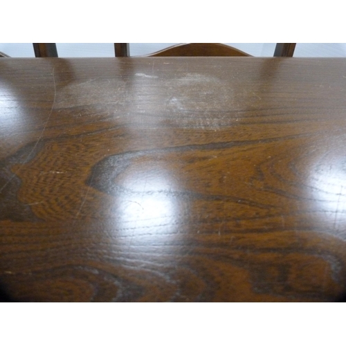 437 - Ercol refectory-style table and a set of six ladder-back chairs.