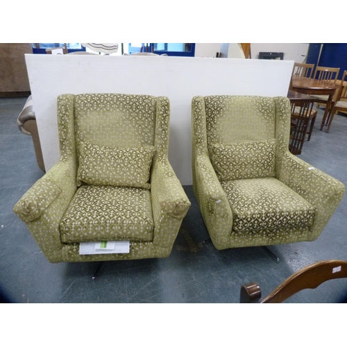 438 - Pair of contemporary green and silvered revolving armchairs, upholstered in Dralon, on chrome-effect... 