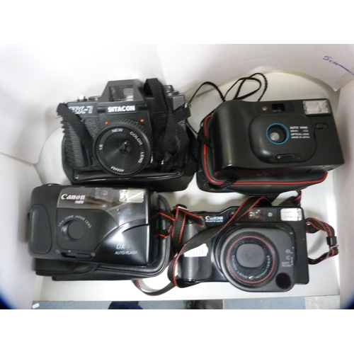 48 - Pair of cased binoculars, four cameras to include Canon etc.