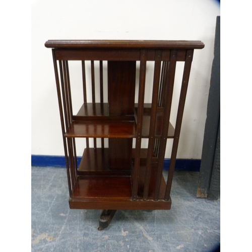 480 - Mahogany revolving bookcase on platform base and castors.