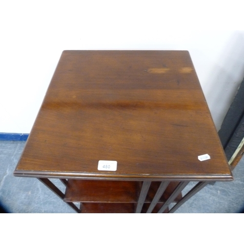 480 - Mahogany revolving bookcase on platform base and castors.