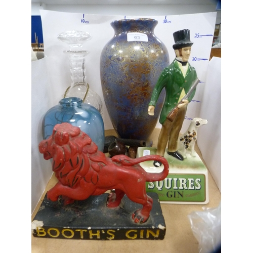 63 - Cut glass decanter, art pottery vase signed 'Muller', Booth's Gin advertising figure, Squire's Gin a... 