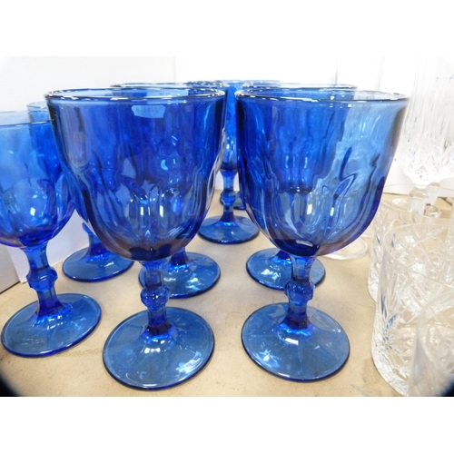 65 - Set of six blue glass red wine glasses and a matching set of white wine glasses, also cut glass whis... 