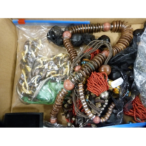 71 - Collection of costume jewellery to include beads, bangles etc.